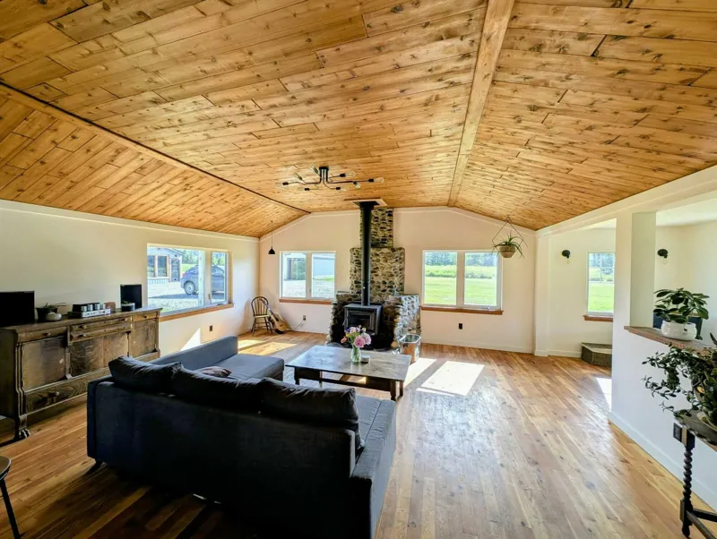 The wood ceiling over the open living room