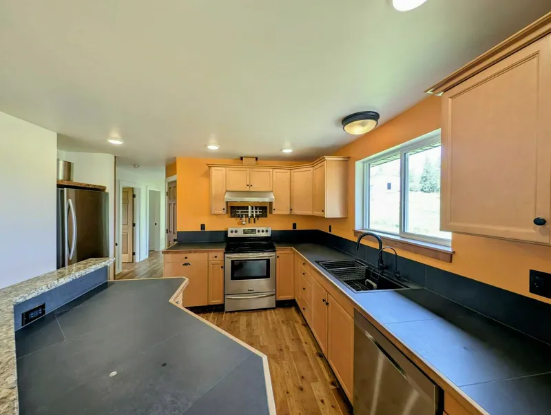 The kitchen, with windows onto the fields