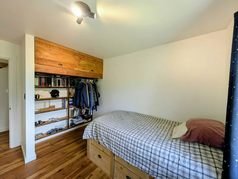 The second bedroom, with built-in fir cabinetry