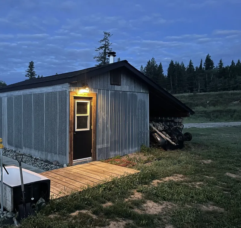 The garden shed and sauna at dusk